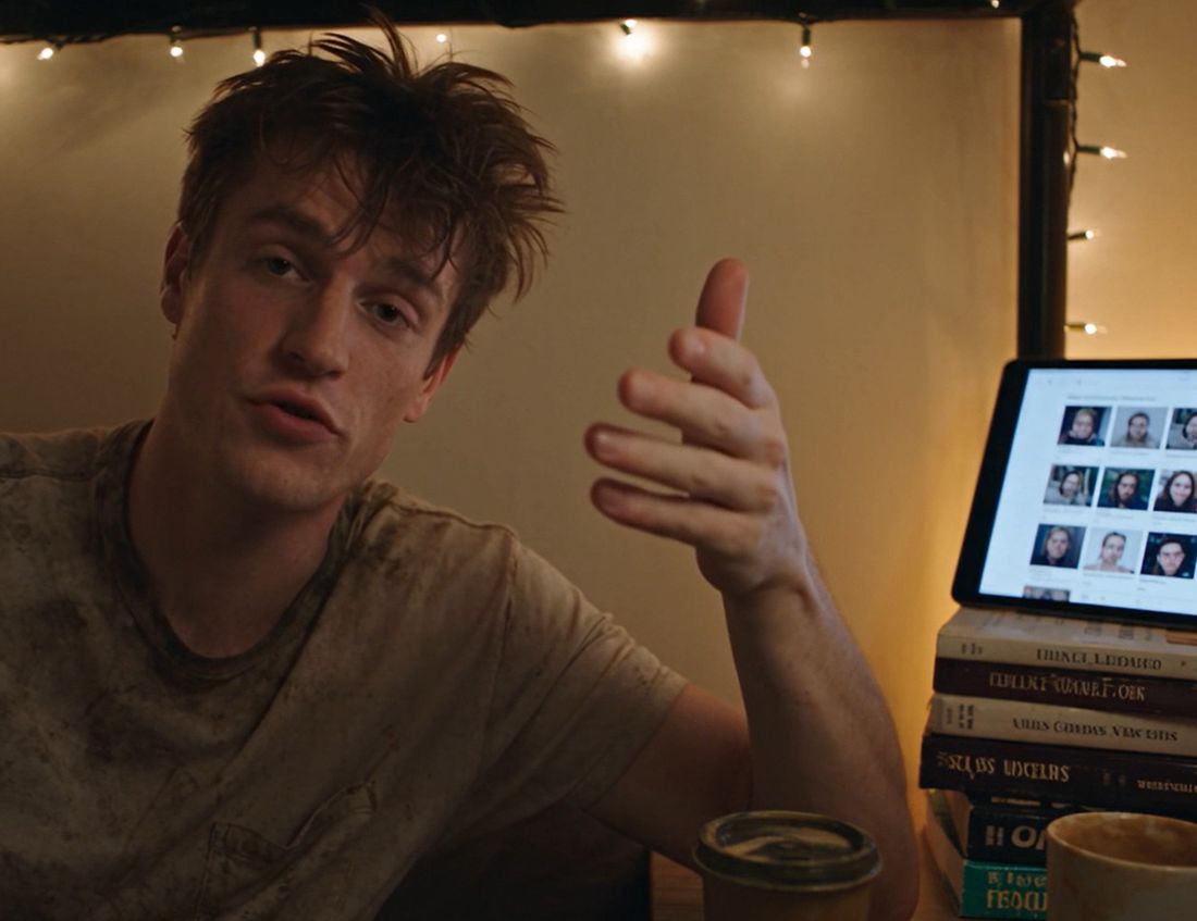 Someone answering questions on camera from their room